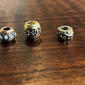 Bundle of gold Pandora-style beads